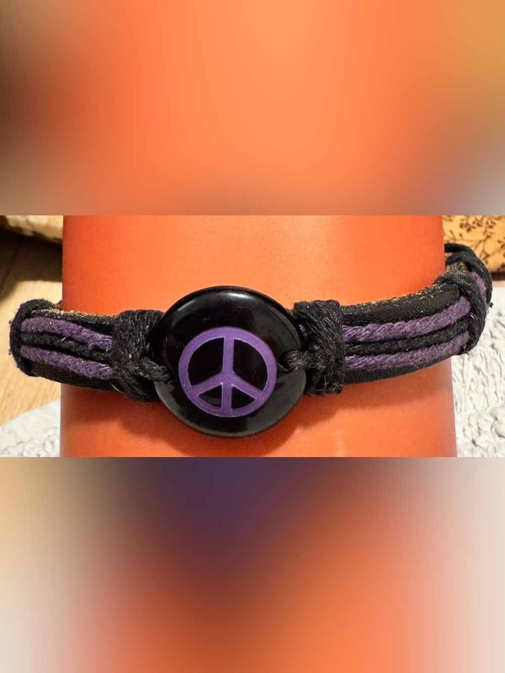 Black Button Bracelet with Purple Peace Sign